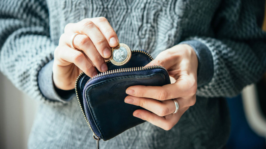 Woman with cash in purse