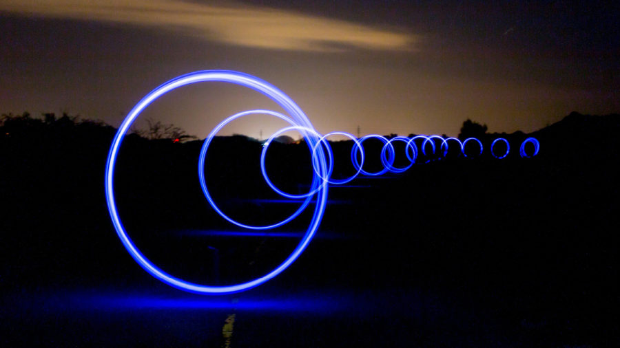 unstructured data Loops of light against night sky