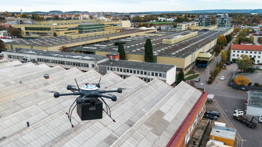 drone flying over warehouse