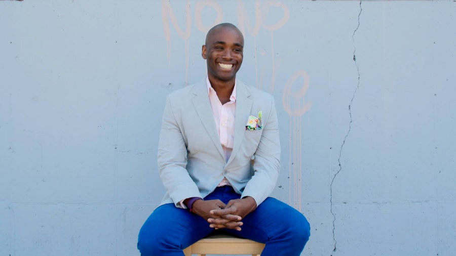 wifi engineer LeRon Barton sitting in front of a white wall