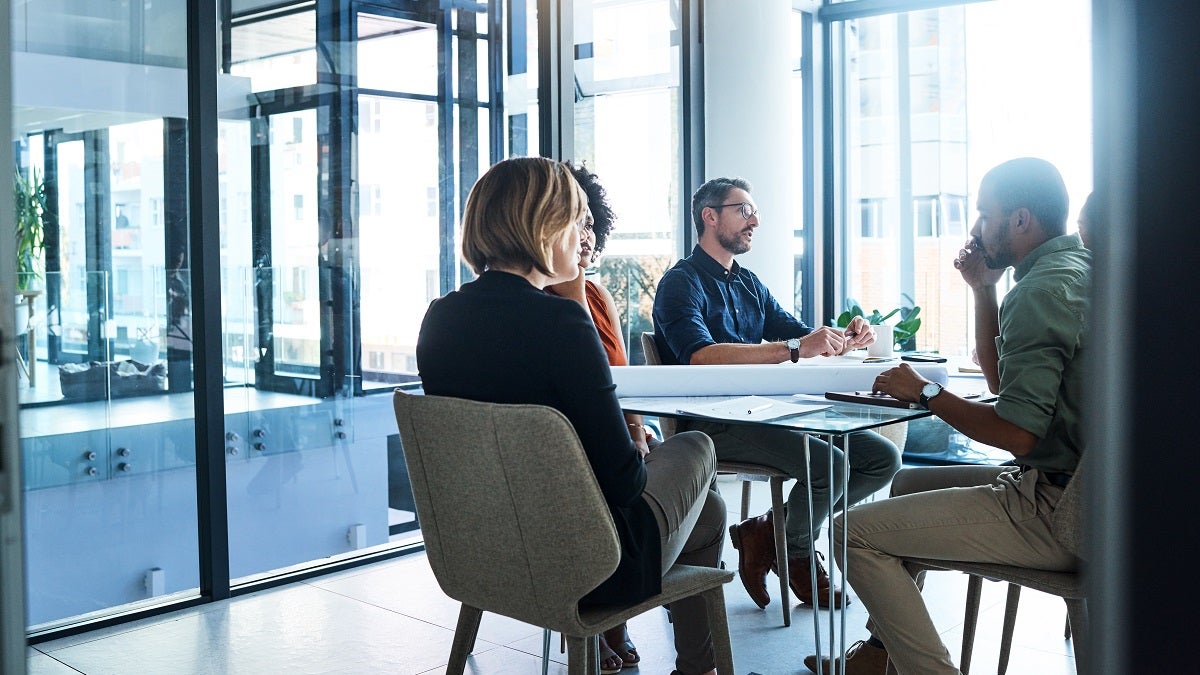 Shot of a group of businesspeople having a meeting in an office