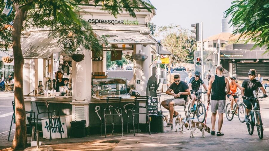 People Sitting Outside Of A Cafe In The Morning In Tel Aviv Israel