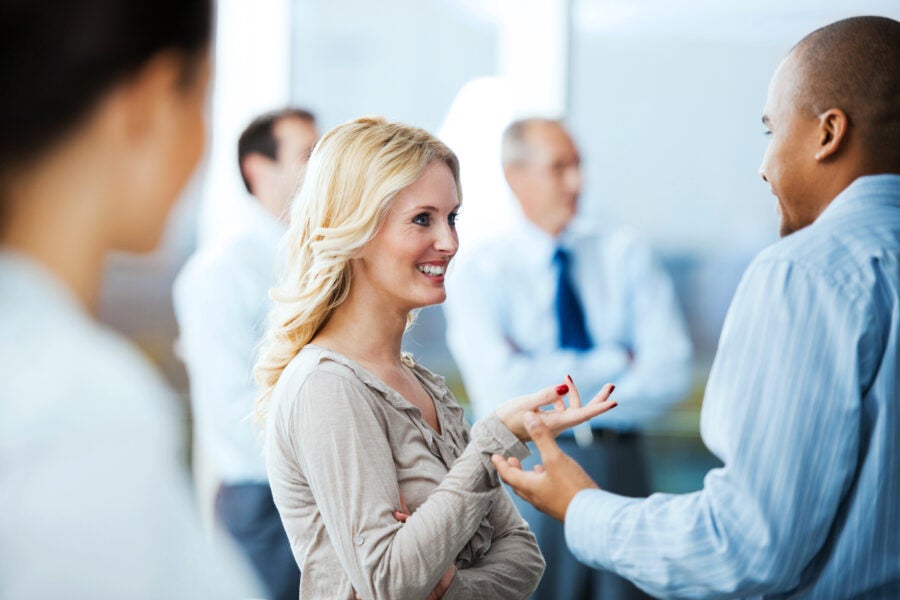 Group Of Successful Businesspeople Standing And Talking.