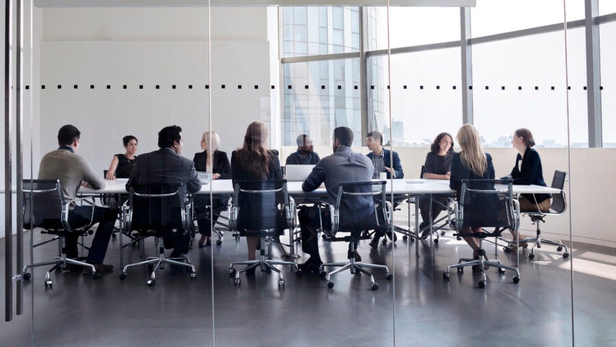 Colleagues At Business Meeting In Conference Room